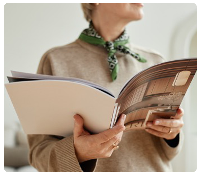 woman holding catalog