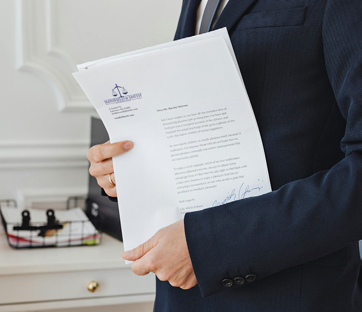 lawyer holding documents