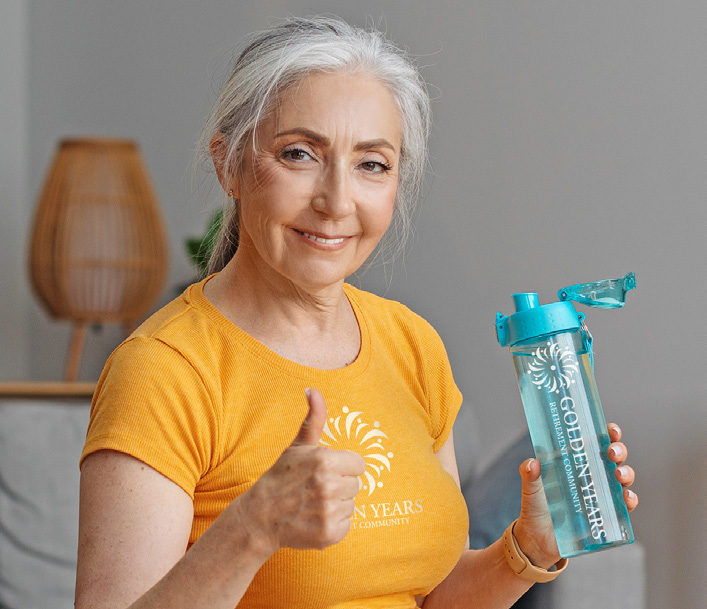 woman holding water bottle